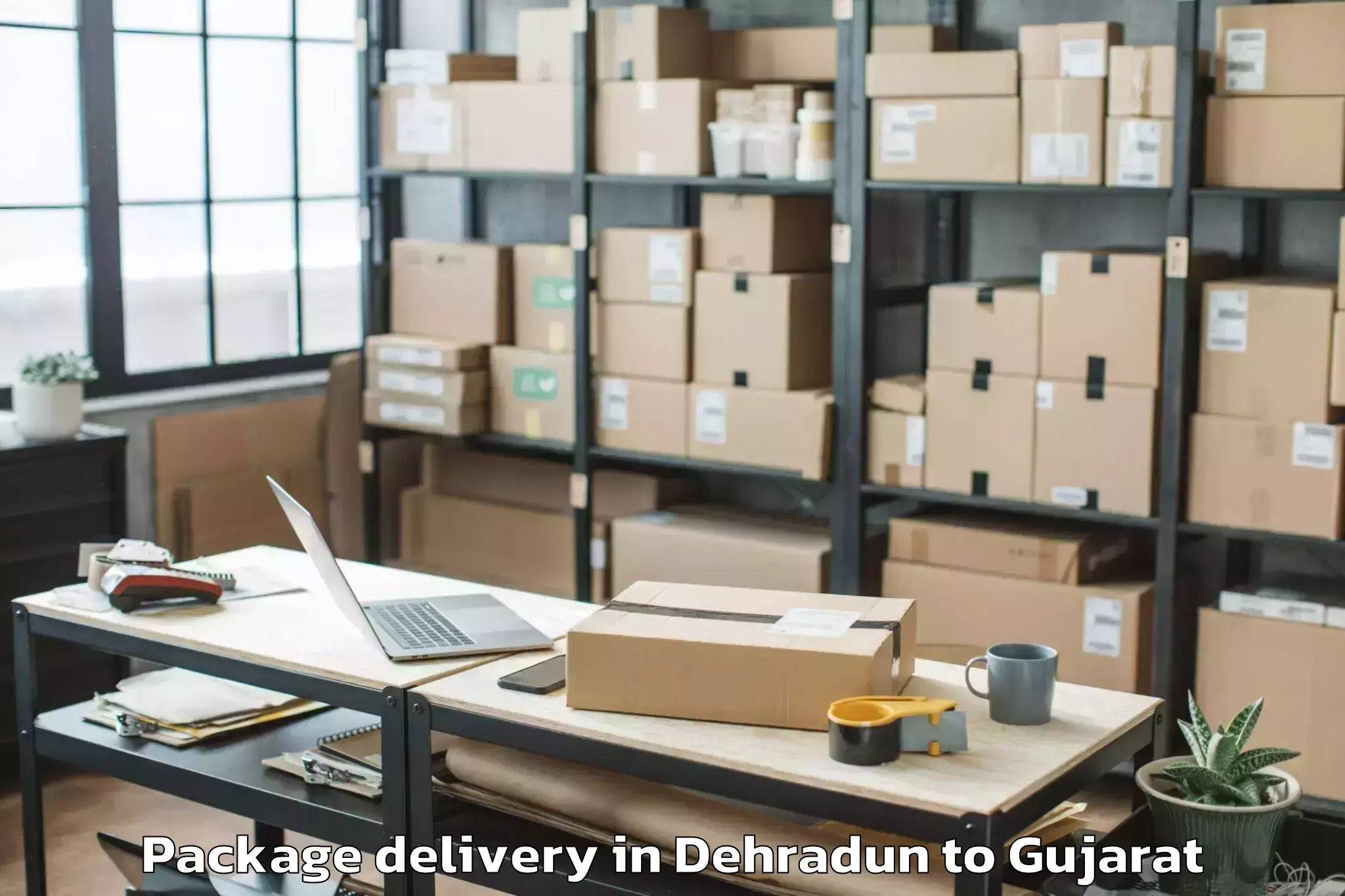 Hassle-Free Dehradun to Delvada Package Delivery